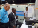 ITU Secretary General Hamadoun Toure, HB9EHT, takes up the operating position of HS2013ITU, as IARU Region 3 Chairman Gopal Madhavan, VU2GMN (left), and Sakol Nakin, HS1JNB, look on. [Tony Waltham, HS0ZDX, photo]